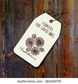 Tag template with bouquet of chrysanthemums on wood background. Suitable for floral shops. wedding designs, web and print
