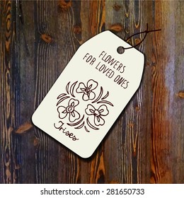 Tag template with bouquet of irises on wood background. Suitable for floral shops. wedding designs, web and print