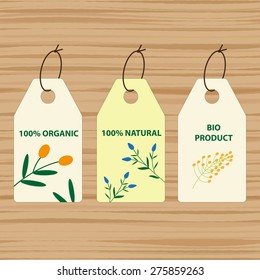 Tag templates on wooden vector background. 100% Organic, Natural, Bio product. Can be used for products, food, cosmetics.