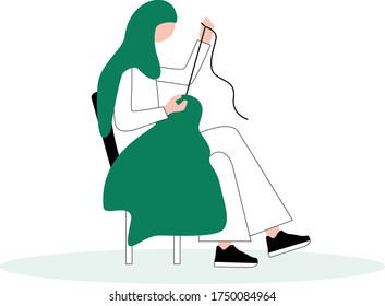 The tailor sewing by hand