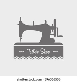 Tailor shop label, logo, emblem or designed element with sewing machine. 