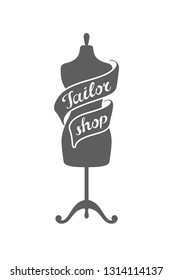Tailor shop vintage logo emblem in lettering style with measure tape and manneguin (dummy, layman). Sewing atelier icon. Clothing repair industry label. Vector illustration design. Vintage craft sign