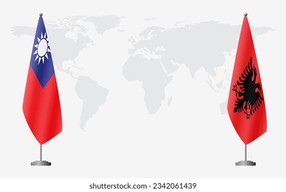 Taiwan and Albania flags for official meeting against background of world map.