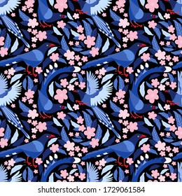 Taiwan blue bird among the leaves and pink flowers seamless pattern. Azure magpie is the symbol of Taiwan. Background from exotic birds of Asia. Urocissa caerulea. Flat vector illustration