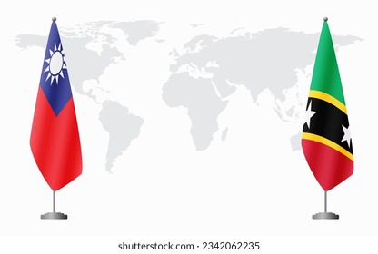 Taiwan and Saint Kitts and Nevis flags for official meeting against background of world map.
