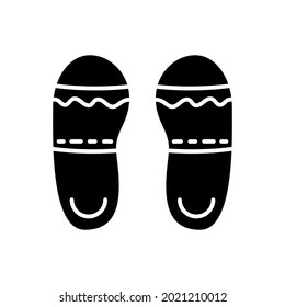 Taiwan slippers glyph icon. Taiwanese walking shoes. Oriental footwear. Asian item. Black filled symbol. Isolated vector stock illustration