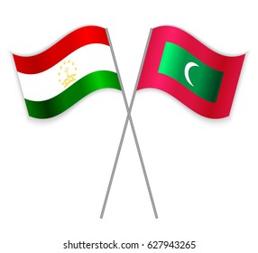 Tajikistani and Maldivian crossed flags. Tajikistan combined with Maldives isolated on white. Language learning, international business or travel concept.