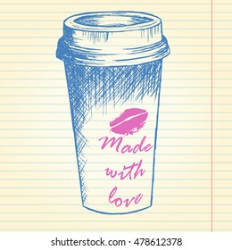 Take away coffee cup on notebook background
