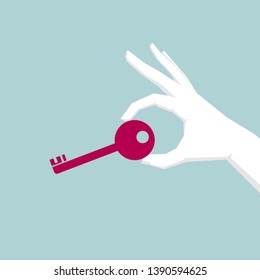Take the key in hand. Isolated on blue background.