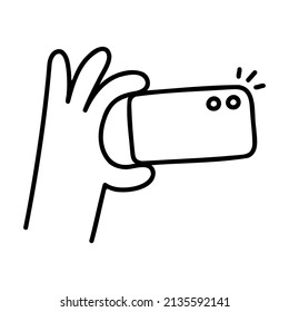 Take a Photo. Hand Drawn Doodle Icon.