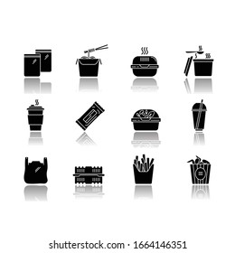 Takeaway food packages drop shadow black glyph icons set. Take out meal containers, boxes for delivery. Noodles, bucket of chicken wings, french fries. Isolated vector illustrations on white space