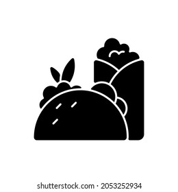 Takeaway mexican food black glyph icon. Burritos and tacos. Traditional mexican cuisine. Soft, flat corn tortillas. Street food. Silhouette symbol on white space. Vector isolated illustration