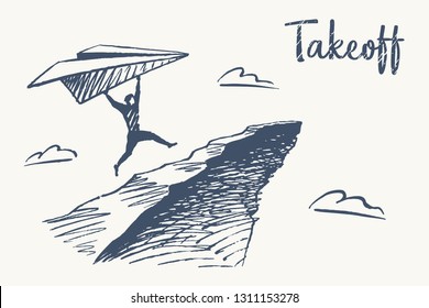 Takeoff. A man runs over the cliff with a paper plane.