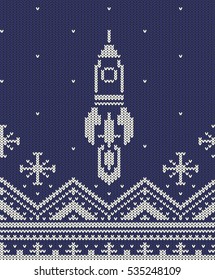 Takes off white rocket on a dark blue background - seamless knitted ornament. Pattern for a sweater - included in swatches panel.
