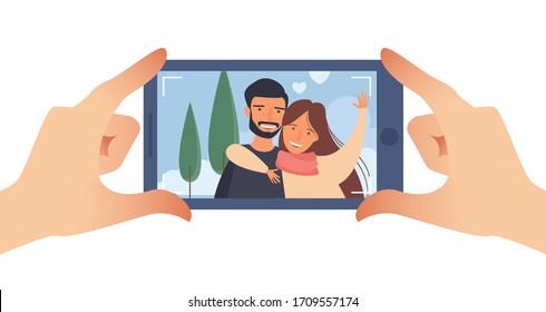Taking a picture on a smartphone. Smiling couple. Horizontal photo. Hands holding smartphone. For your design