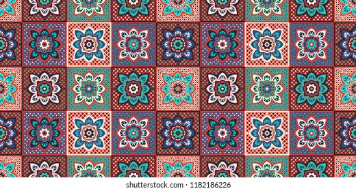 Talavera pattern.  Indian patchwork. Azulejos portugal. Turkish ornament. Moroccan tile mosaic. Ceramic tableware, folk print. Spanish pottery. Ethnic background. Mediterranean seamless  wallpaper.