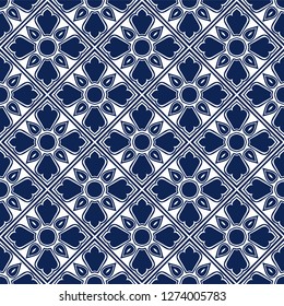 Talavera pattern.  Indian patchwork. Azulejos portugal. Turkish ornament. Moroccan tile mosaic. Ceramic tableware, folk print. Spanish pottery. Ethnic background. Mediterranean seamless  wallpaper.