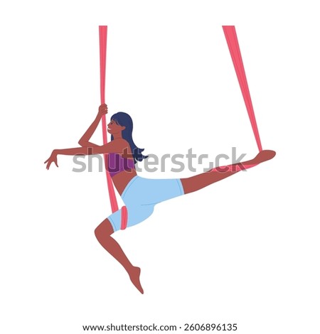 A talented aerial dancer showcases breathtaking stunts while elegantly maneuvering through vibrant silk ribbons