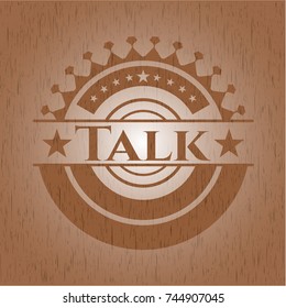 Talk badge with wooden background