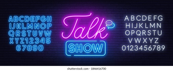 Talk show neon sign on brick wall background.