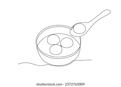 A tangyuan meal on a spoon. Dongzhi festival one-line drawing