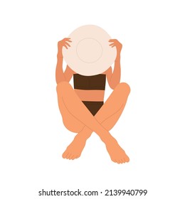 Tanning girl in a swimsuit sitting and holding sun hat. Resting woman sunbathing on the beach. Summer, summertime vacation aesthetic. Vector illustration in cartoon style. Isolated white background.