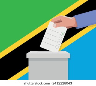 Tanzania election concept. Hand puts vote bulletin into vote box.