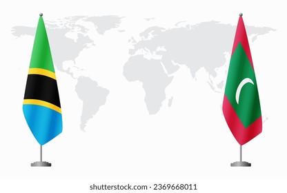 Tanzania and Maldives flags for official meeting against background of world map.