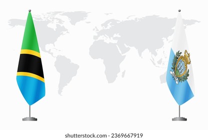 Tanzania and San Marino flags for official meeting against background of world map.