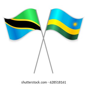 Tanzanian and Rwandan crossed flags. Tanzania combined with Rwanda isolated on white. Language learning, international business or travel concept.