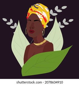 Tanzanian woman with bright turban and jewelry