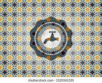 tap icon inside arabesque style badge. arabic decoration.