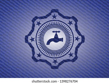 tap icon inside badge with denim background