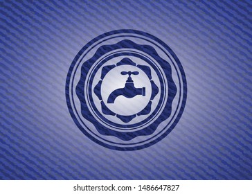 tap icon inside badge with jean texture