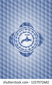 tap icon inside blue emblem with geometric background.
