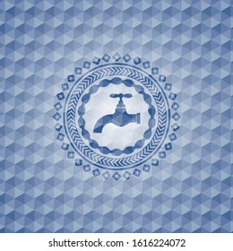 tap icon inside blue hexagon badge.