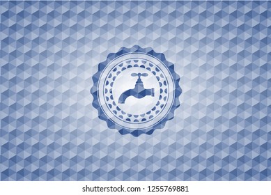 tap icon inside blue polygonal badge.