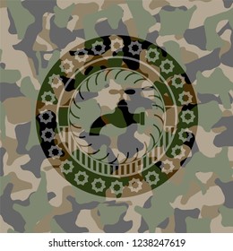tap icon inside camo emblem