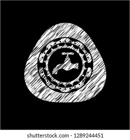 tap icon inside chalk emblem written on a blackboard