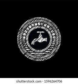 tap icon inside chalkboard emblem written on a blackboard