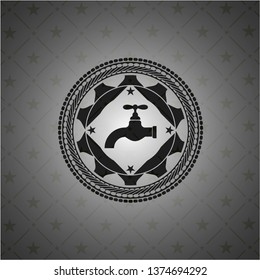 tap icon inside dark emblem