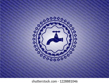 tap icon inside denim background