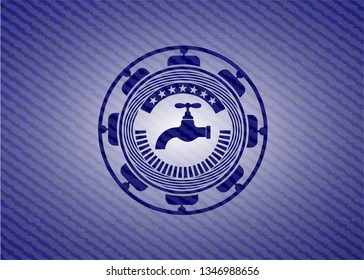 tap icon inside denim background