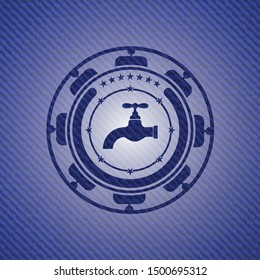 tap icon inside denim background