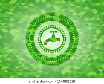 tap icon inside green emblem with mosaic background