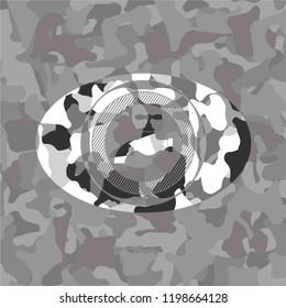 tap icon inside grey camouflage texture