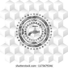 tap icon inside grey emblem with geometric cube white background