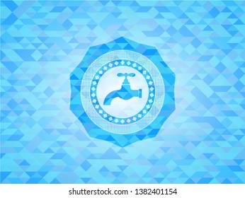 tap icon inside light blue mosaic emblem