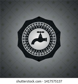 tap icon inside realistic black emblem