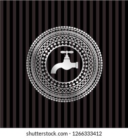 tap icon inside silver emblem or badge
